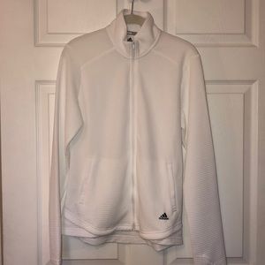 white zip up jacket